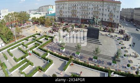 MOSCOW - AUG 12, 2014: Buildings of Moscow festival jam and Happy labyrinth on Tverskaya Square near the monument to Yuri Dolgoruky, aerial view Stock Photo