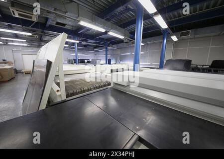 Large machines preparing samples for print in Polygraph complex Stock Photo