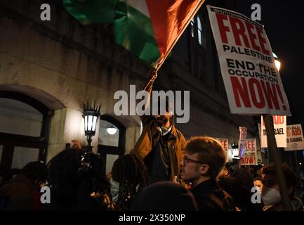 New York, USA. 24th Apr, 2024. A man waves a Palestinian flag during a pro-Palestinian demonstration outside Columbia University in New York, the United States, on April 24, 2024. Columbia University, amidst an eighth day of tense demonstrations, said on Wednesday that it has extended negotiations with student activists regarding the dismantling of a pro-Palestinian encampment. Credit: Li Rui/Xinhua/Alamy Live News Stock Photo