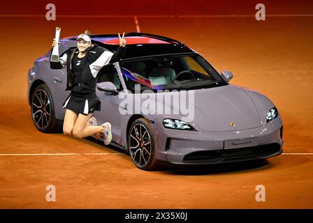 Winner Elena Rybakina (KAZ) in the picture, sitting in the Porsche 911 ...