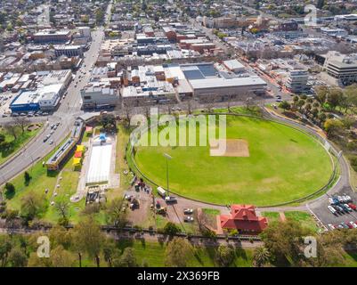 Aerial view of a sports oval alongside a the city centre of Tamworth in New South Wales, Australia. Stock Photo