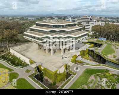 Aerial view of Geysel library at the University of California San Diego, futuristic building, columns holding up upper floor like books, next to the s Stock Photo