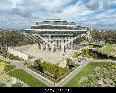 Aerial view of Geysel library at the University of California San Diego, futuristic building, columns holding up upper floor like books, next to the s Stock Photo