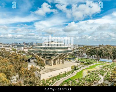 Aerial view of Geysel library at the University of California San Diego, futuristic building, columns holding up upper floor like books, next to the s Stock Photo