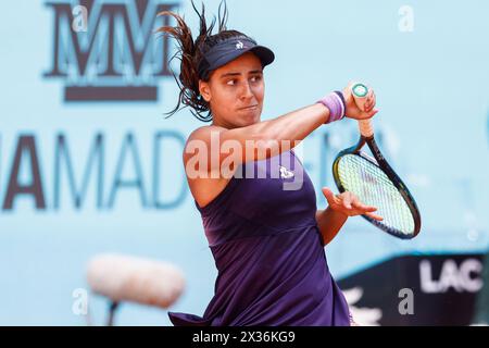 Maria Lourdes Carle of Argentina in action against Emma Raducano of Great Britain during the Mutua Madrid Open 2024, ATP Masters 1000 and WTA 1000, tennis tournament on April 24, 2024 at Caja Magica in Madrid, Spain Stock Photo