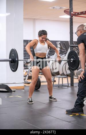 female athlete exercise deadlift in powerlifting competition Stock ...