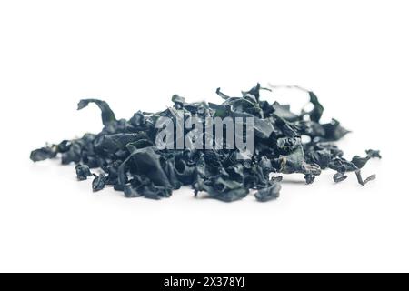 Dried wakame seaweed isolated on a white background. Stock Photo