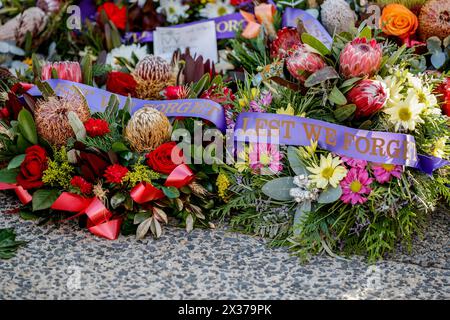 Wreaths laid at the Cairns Cenotaph during the service on ANZAC Day ...