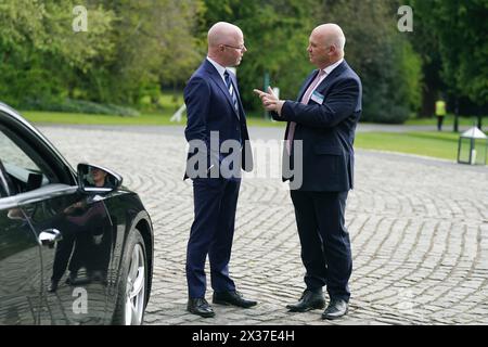 Minister for Health Stephen Donnelly (left) in conversation with former chief medical officer Dr. Tony Holohan after attending the Joint Euro-American Forum on Cancer at Farmleigh House, Dublin. Picture date: Thursday April 25, 2024. Stock Photo
