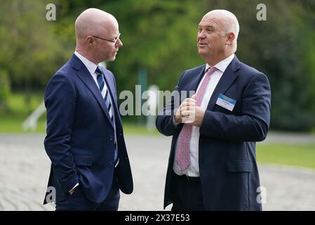 Minister for Health Stephen Donnelly (left) in conversation with former chief medical officer Dr. Tony Holohan after attending the Joint Euro-American Forum on Cancer at Farmleigh House, Dublin. Picture date: Thursday April 25, 2024. Stock Photo