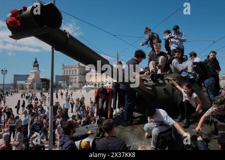 RECORD DATE NOT STATED 50th Anniversary of the Carnation Revolution in Lisbon The public gets access to antique military vehicles that were used to overthrow the regime. To mark the 50th anniversary of the Carnation Revolution that overthrew a dictatorship and to celebrate 50 years of freedom, through the streets of Lisbon, citizens are invited to trace the paths of the Revolution. A military ceremony is presided over by President Marcelo Rebelo de Sousa, at Terreiro do Paco. The historical reenactment of the End of Regime Operation displays a column of Antique Military Vehicles. Lisbon Lisbon Stock Photo