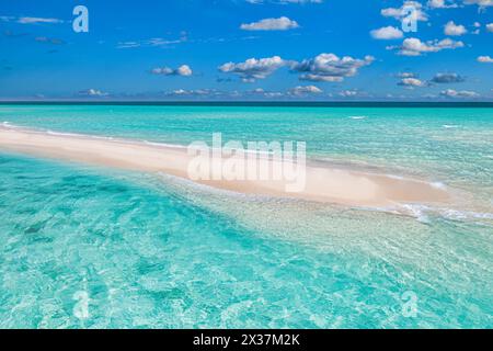Closeup of sand on beach and blue summer sky. Panoramic beach landscape. Empty tropical beach and seascape. Orange and golden sunset sky, soft sand Stock Photo
