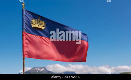 Die Fahne von Liechtenstein flattert im Wind Stock Photo