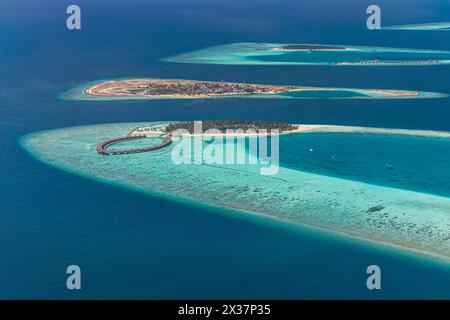 Perfect aerial landscape, luxury tropical resort or hotel with water villas and beautiful beach scenery. Amazing bird eyes view in Maldives, landscape Stock Photo