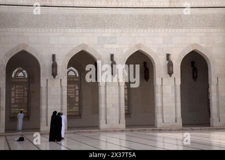 omani men and women rawiq sultan qaboos grand mosque muscat oman middle east Stock Photo
