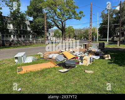 Garbage next to the road in the city Stock Photo