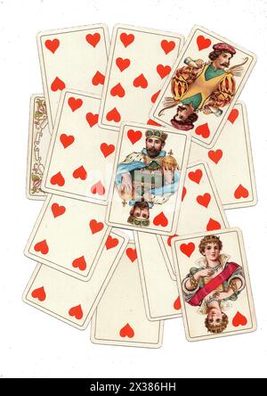 A montage of antique playing cards showing hearts isolated on a white background. Stock Photo