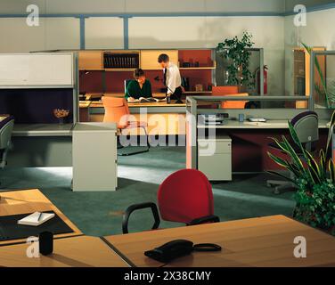 People working in office interior. Stock Photo