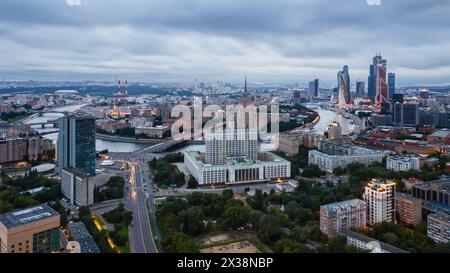 MOSCOW - JUN 10, 2016: Government Building, Ukraine hotel and Moskva river at overcast day Stock Photo