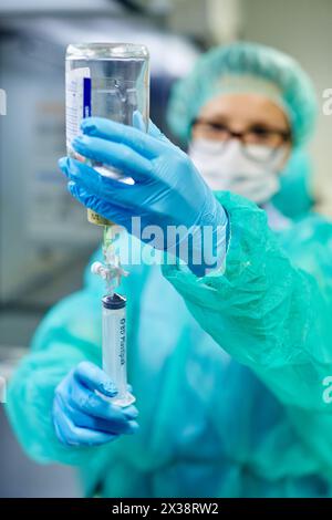 Preparation of drugs in laminar flow hood, epidural anesthesia, Clean room, Pharmacy, Hospital Donostia, San Sebastian, Gipuzkoa, Basque Country, Spai Stock Photo