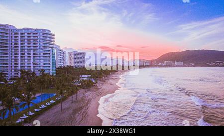 Panoramic view at dawn of Ixtapa Bay, where the waves were beginning to get stronger. Stock Photo