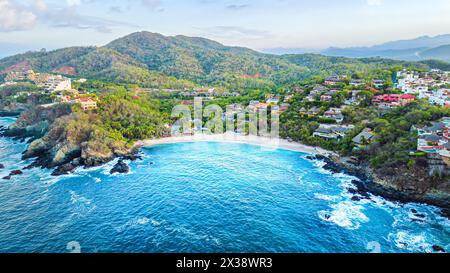 Panoramic view at dawn of Ixtapa Bay, where the waves were beginning to get stronger. Stock Photo