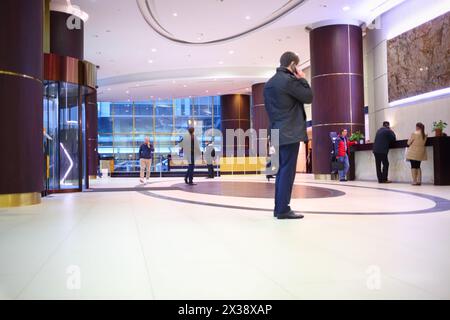 MOSCOW - OCT 20, 2016: People in hall in Empire tower in Moscow city ...