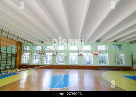 MOSCOW, RUSSIA - JUN 28, 2016: Gym with volleyball net in 2107 school, In Moscow there are more than 1800 schools Stock Photo