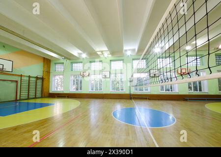 MOSCOW, RUSSIA - JUN 28, 2016: Modern gym with volleyball net in 2107 school, In Moscow there are more than 1800 schools Stock Photo