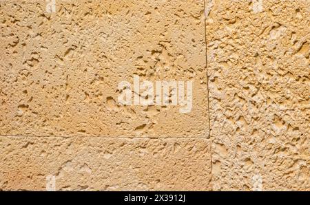 Beige stone material rough texture pattern background Stock Photo