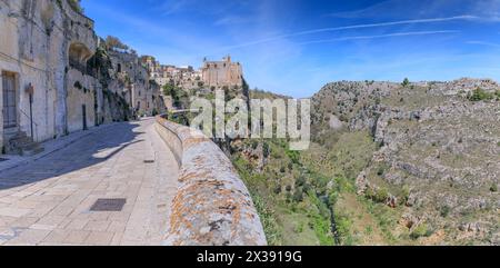 Skyline of the Sassi di Matera from Madonna della Virtù Street, Italy: view of the Murgia Materana Nature Reserve and Cave Churches. Stock Photo