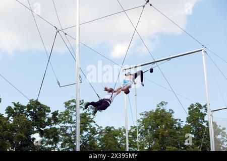 MOSCOW - MAY 26, 2016: Acrobats show. In Moscow, opened first in Russia trapeze for Air flight school and aerial gymnastics Trapeze Yota - school and Stock Photo