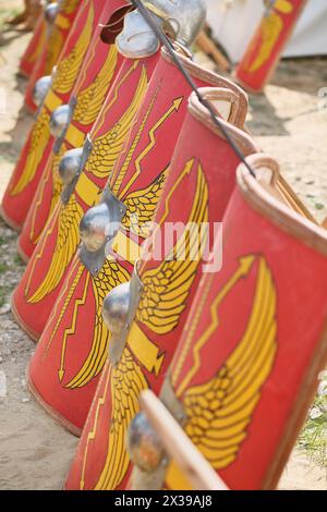 MOSCOW - JUN 06, 2015: The row of shields of soldiers in the Roman military camp at the festival Times and epoch: Ancient Rome in Kolomenskoye Stock Photo