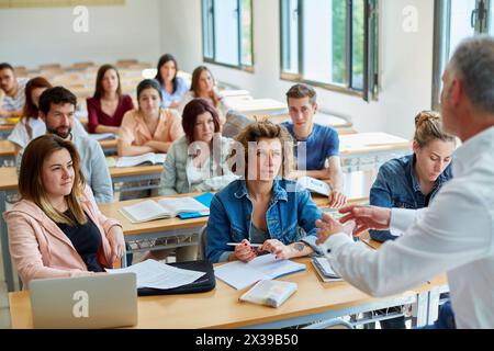 Teacher with students. Classroom. College. School of Business Studies EUEE. Gipuzkoa Campus. UPV. EHU. Basque Country University. Donostia. San Sebast Stock Photo