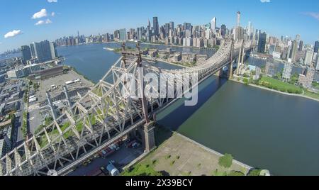 Queensboro Bridge at summer sunny day in New-York City. Aerial view Stock Photo