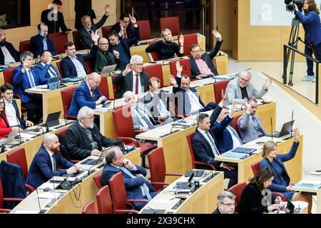 Munich, Germany. 25th Apr, 2024. Members of the AfD parliamentary group take part in a vote during the 17th plenary session of the Bavarian State Parliament on 25.04.2024 in Munich (Bavaria). They include Oskar Lipp, Johannes Meier, Elena Roon, Matthias Vogler, Andreas Winhart, Martin Böhm, Ingo Hahn, and Benjamin Nolte, Oskar Atzinger, Christoph Maier, Richard Graupner, Markus Walbrunn and Katrin Ebner-Steiner, Chairwoman of the AfD parliamentary group in the Bavarian State Parliament. Credit: Matthias Balk/dpa/Alamy Live News Stock Photo