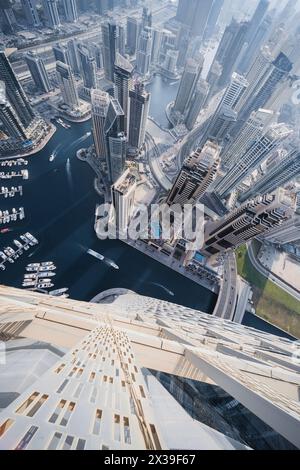 DUBAI, UAE - JAN 20, 2017: Cayan Tower top view in Dubai Marina area, Cayan is tallest building in world, which is twisted by 90 degrees Stock Photo