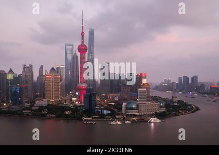 SHANGHAI - AUG 14, 2015: Oriental tower, Pudong District at evening, Oriental tower has height 468 m (1,535 feet), it was the tallest structure in Chi Stock Photo