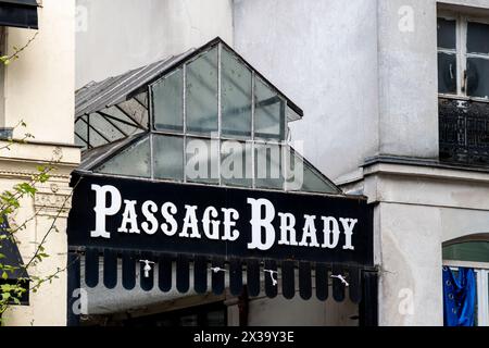 Sign at the entrance to the Passage Brady, a pedestrian passageway covered by a glass roof. It was built in 1828 in the 10th arrondissement of Paris Stock Photo