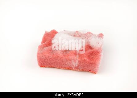 A sponge with soap suds isolated on a white background. Stock Photo