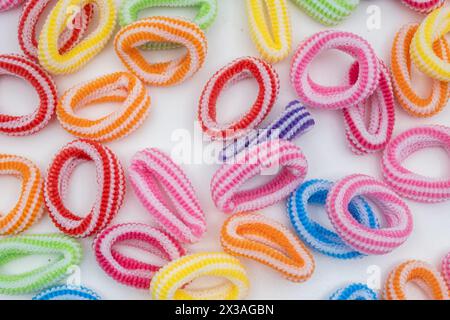 Heap of various hair ties. Multicolored elastics Stock Photo