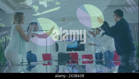 Image of financial data processing over diverse businesspeople in office Stock Photo