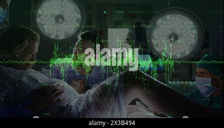 Woman giving birth in labor room of hospital Stock Photo - Alamy