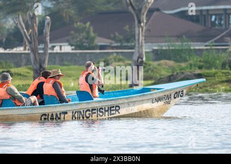 tourists sail by boat on Lake Naivasha. Water safari with viewing of animals and birds. Naivasha lake, Kenya. February 2, 2024. Stock Photo