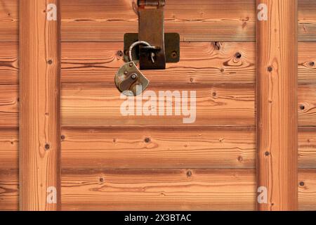 Wooden box with padlock Stock Photo