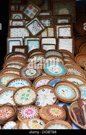 Souvenirs displayed by a shop in the old town of Hoi An, Vietnam. Stock Photo