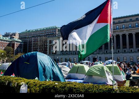 New York, United States. 25th Apr, 2024. The Palestinian flag raised above the encampment area in front of Butler Library. 'Gaza Solidarity Encampment' set up by Pro-Palestine students at Columbia University still remain as they await the end of the 48 hour extension given by the university. Credit: SOPA Images Limited/Alamy Live News Stock Photo