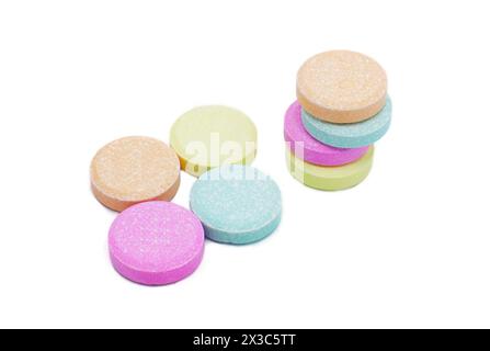 Chewable Antacid tablets for medication, health care concept. Close up of of chewable antacid acid reducer tablets with fruit flavor Isolated on white Stock Photo