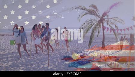 Image of american flag over happy diverse friends on vacation walking with bags on sunny beach Stock Photo