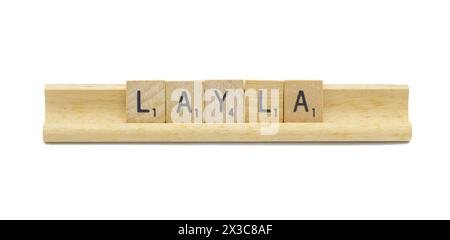 Miami, FL 4-18-24 popular baby girl first name of LAYLA made with square wooden tile English alphabet letters with natural color and grain on a wood r Stock Photo